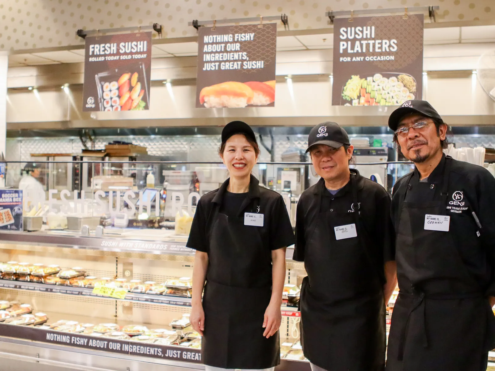 Genji team members at their in-store sushi counter